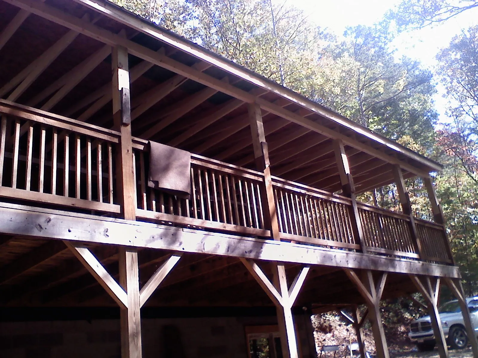 Timber framing under a new elevated porch and deck — Roof Leak Repair in Levasy by Roofing Brothers